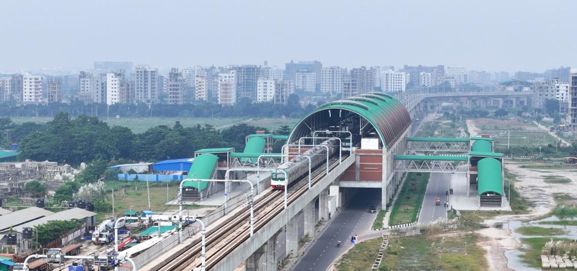 The Dhaka Metro gliding effortlessly above the city's busy streets